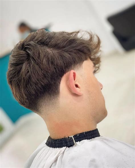 taper cheveux ondulés|Coupe taper : 20 coiffures pour homme tendance en 2024